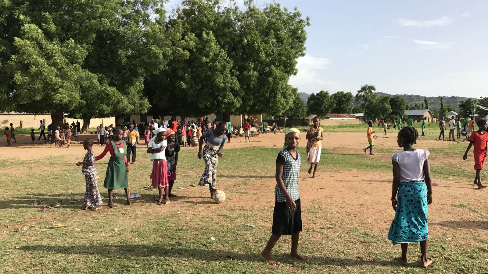 Girls play soccer at an internally displaced persons camp in northeast Nigeria.