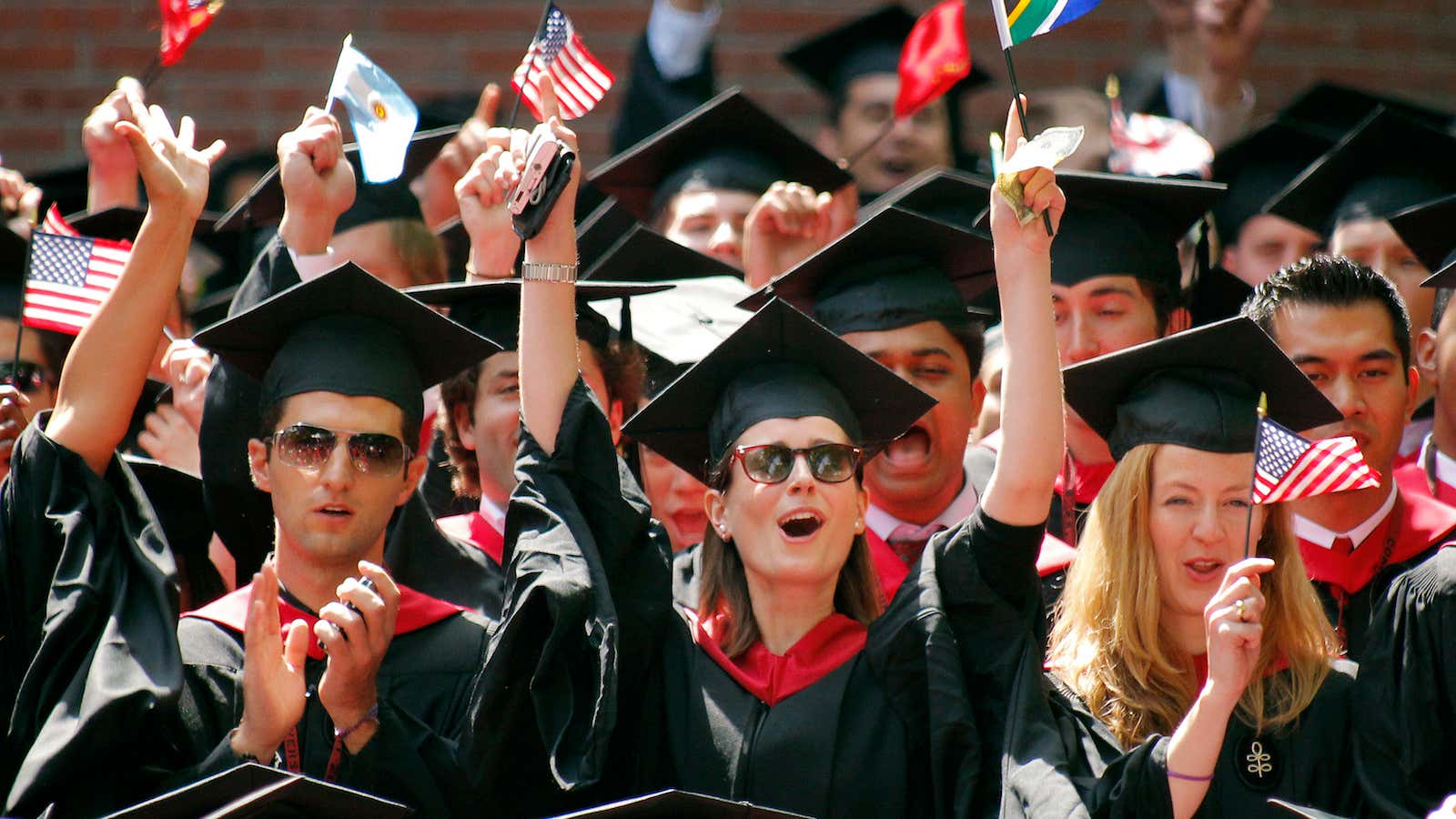 Graduates from the business school celebrate during Harvard University’s 359th Commencement Exercises Harvard University in Cambridge, Massachusetts May 27, 2010. REUTERS/Adam Hunger (UNITED STATES –…