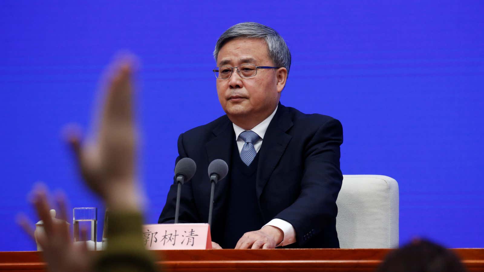 Guo Shuqing, China’s banking regulator, says Beijing won’t join global sanctions against Russia.