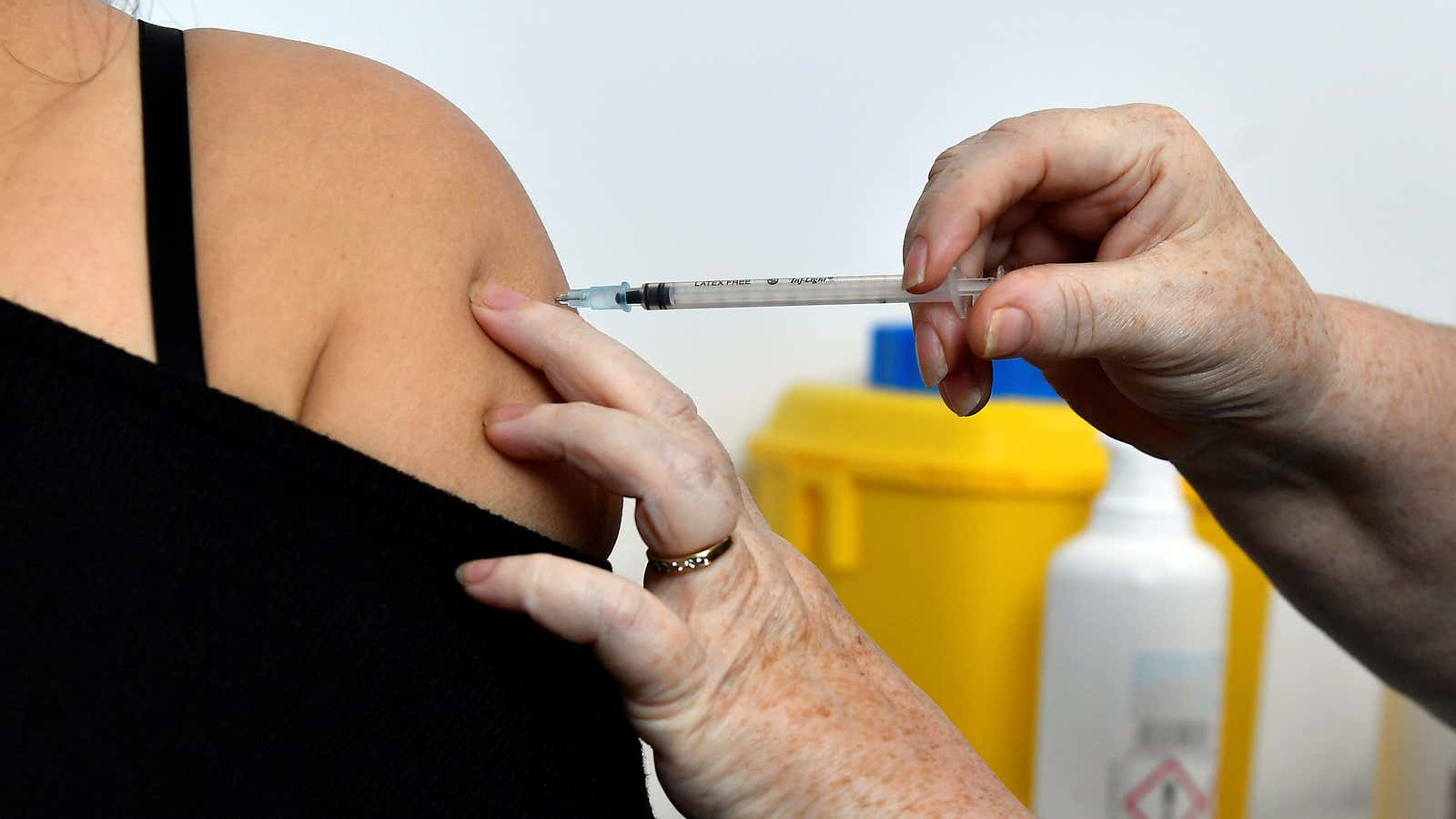 Nurse Muirghen Kelly vaccinates healthcare worker Noemi Cortez with a Pfizer coronavirus disease (COVID-19) vaccine booster at the University College Dublin (UCD) campus clinic for…