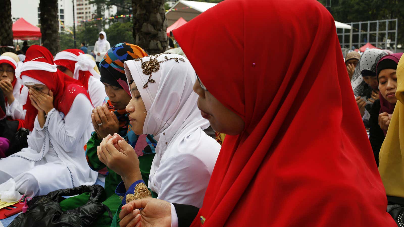 Indonesian domestic helpers at a prayer vigil in Hong Kong in 2014.