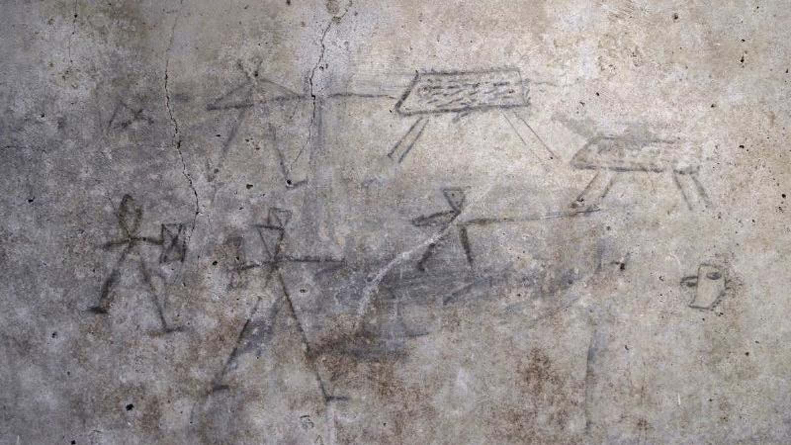 Image for Ancient Gladiator Sketches Likely Drawn by a Child Discovered in Pompeii