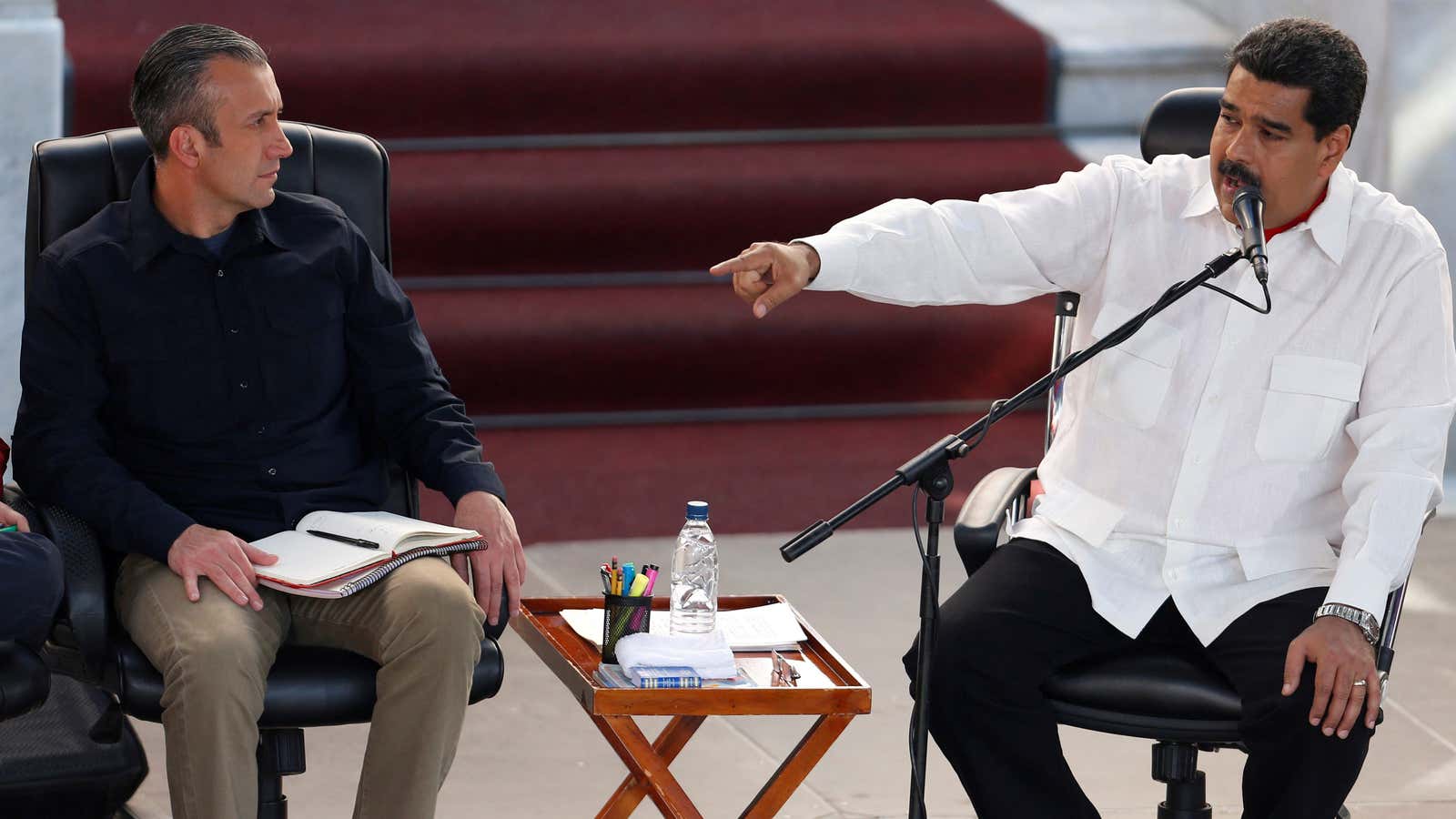 Venezuelan president Nicolas Maduro (R) and vice president Tareck El Aissami.