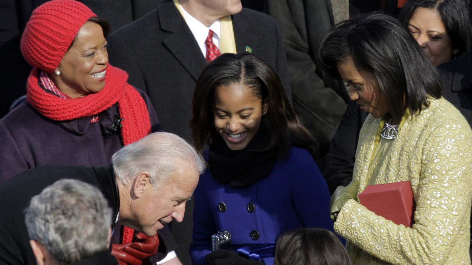 Robinson (left) wears many hats in the Obama household.