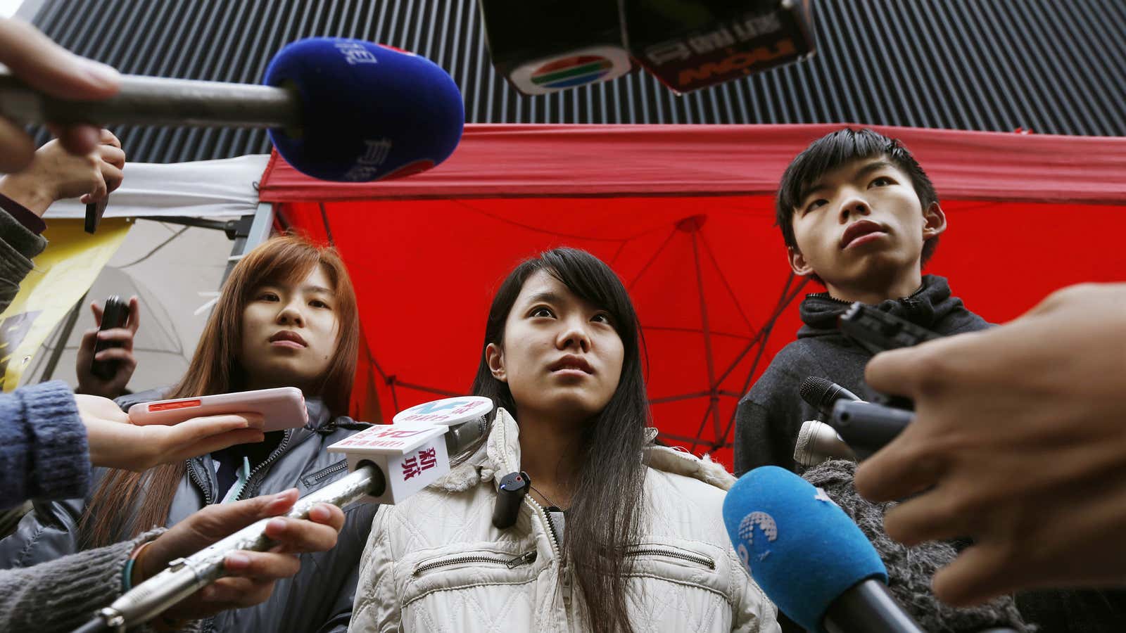 From left, Isabella Lo, Prince Wong, and student leader Joshua Wong announce their hunger strike.