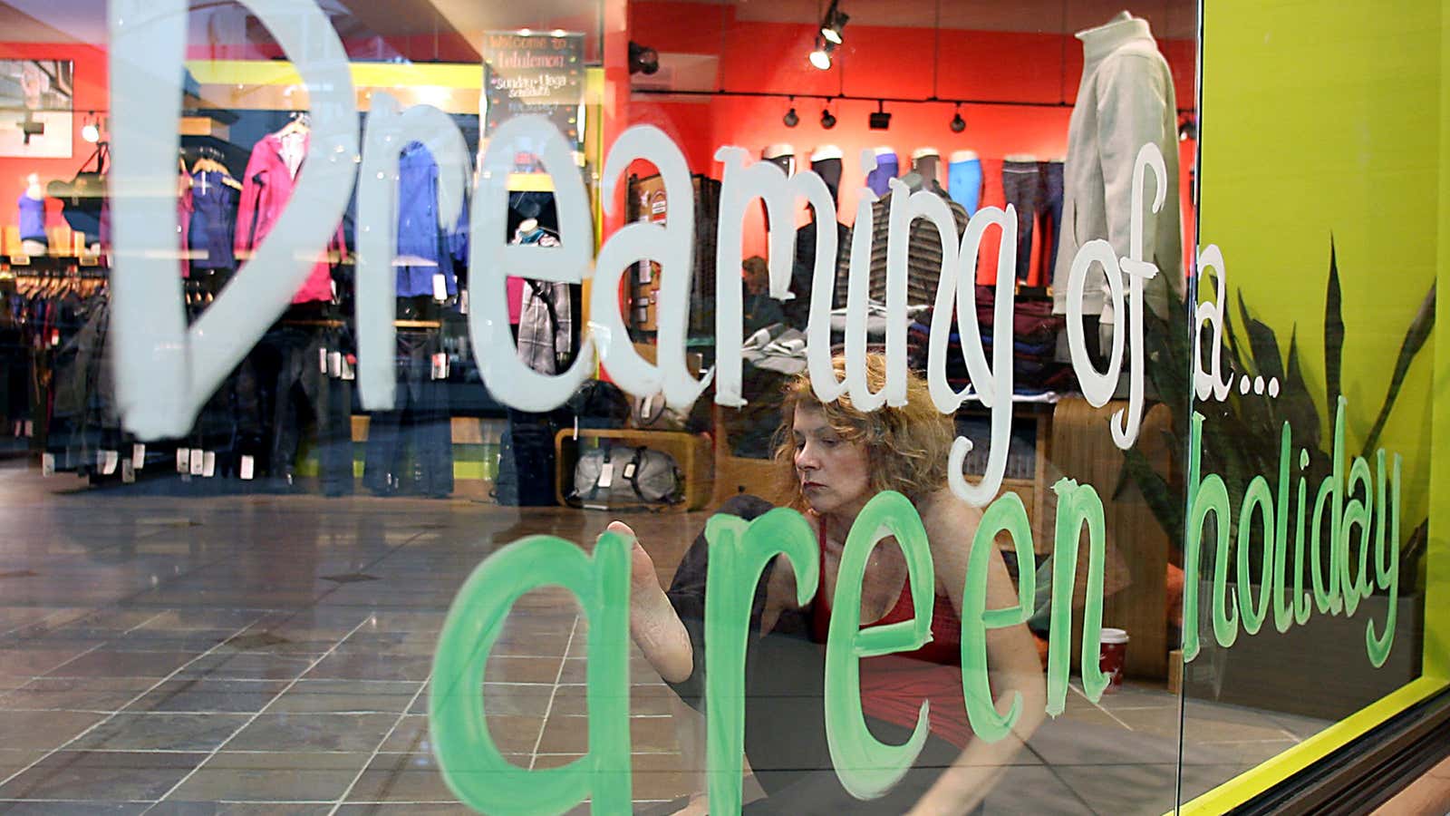 A yogi demonstrates the flattering stretchiness of Lululemon’s gear at a store in Michigan.