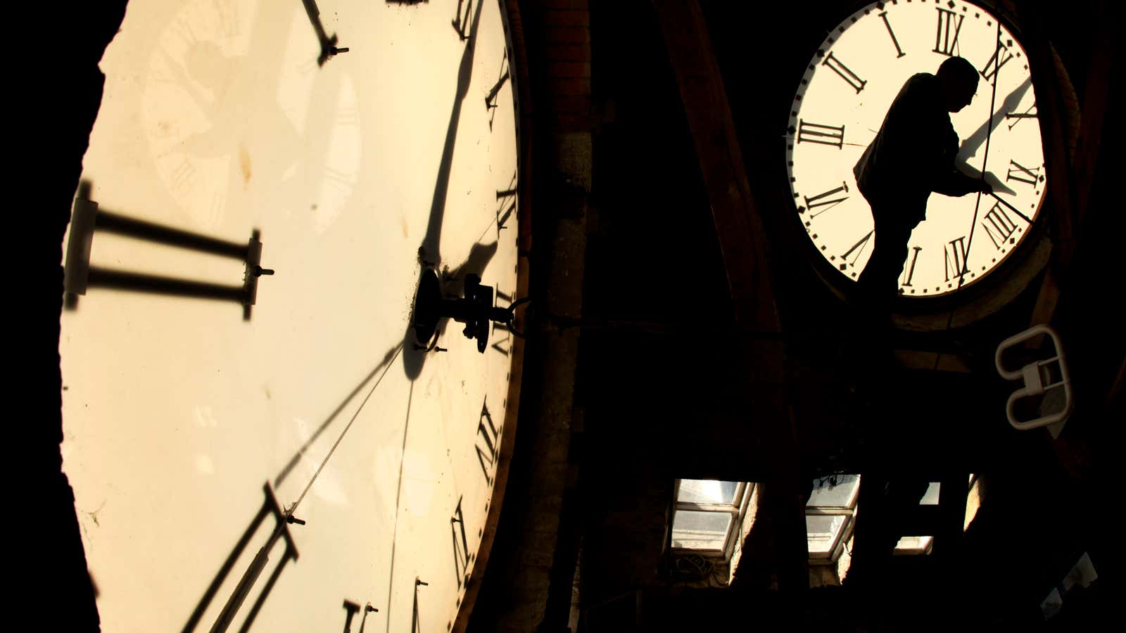 Custodian Ray Keen checks the time on a clock face after changing the time on the 97-year-old clock atop the Clay County Courthouse, Saturday, Nov. 6, 2010, in Clay Center, Kan. Keen was setting time back an hour in advance of the end of daylight savings time which occurs at 2 a.m. on Sunday. (AP Photo/Charlie Riedel)