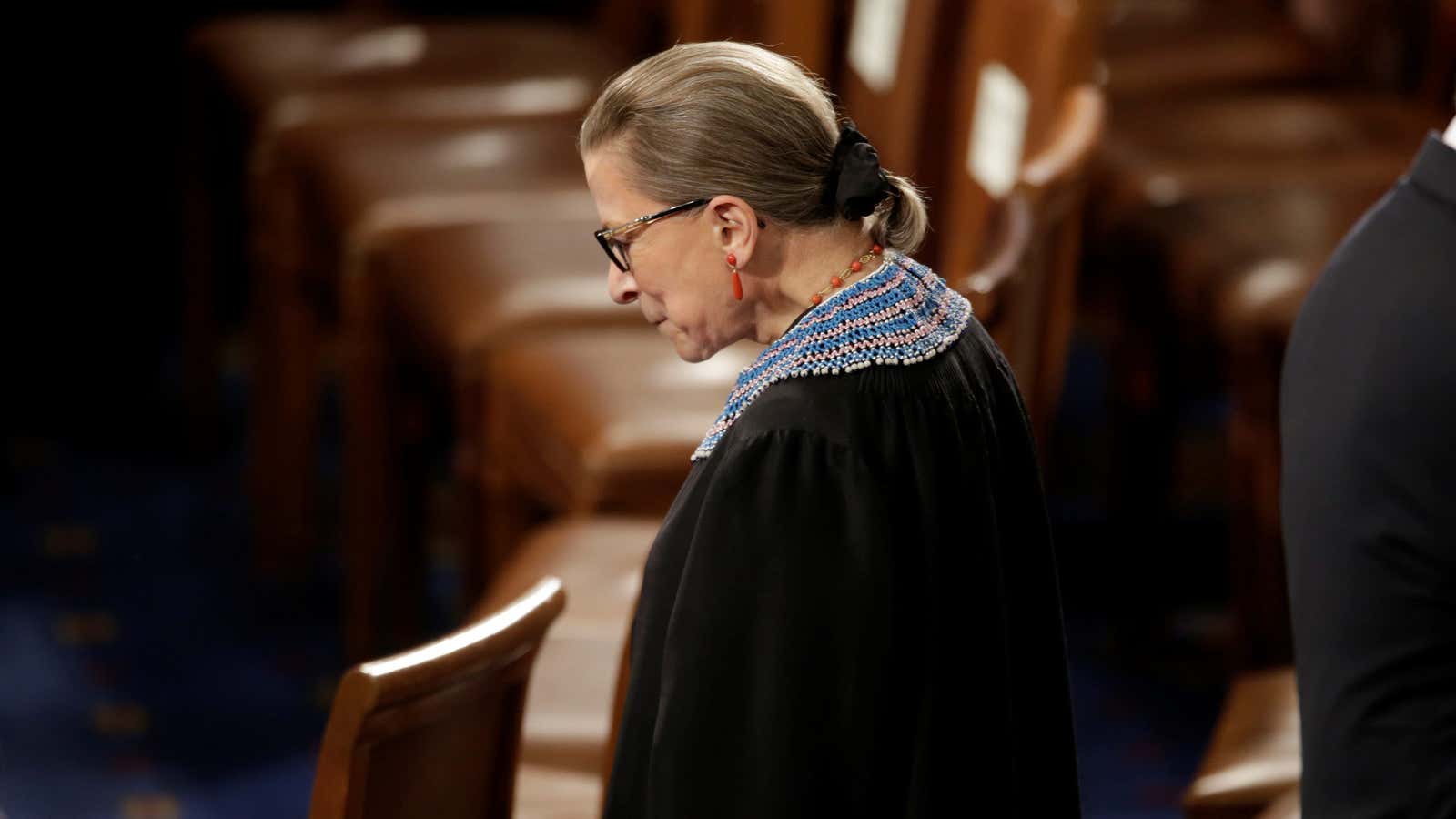 FILE PHOTO: U.S. Supreme Court Associate Justice Ruth Bader Ginsburg arrives to watch U.S. President Barack Obama’s State of the Union address to a joint…