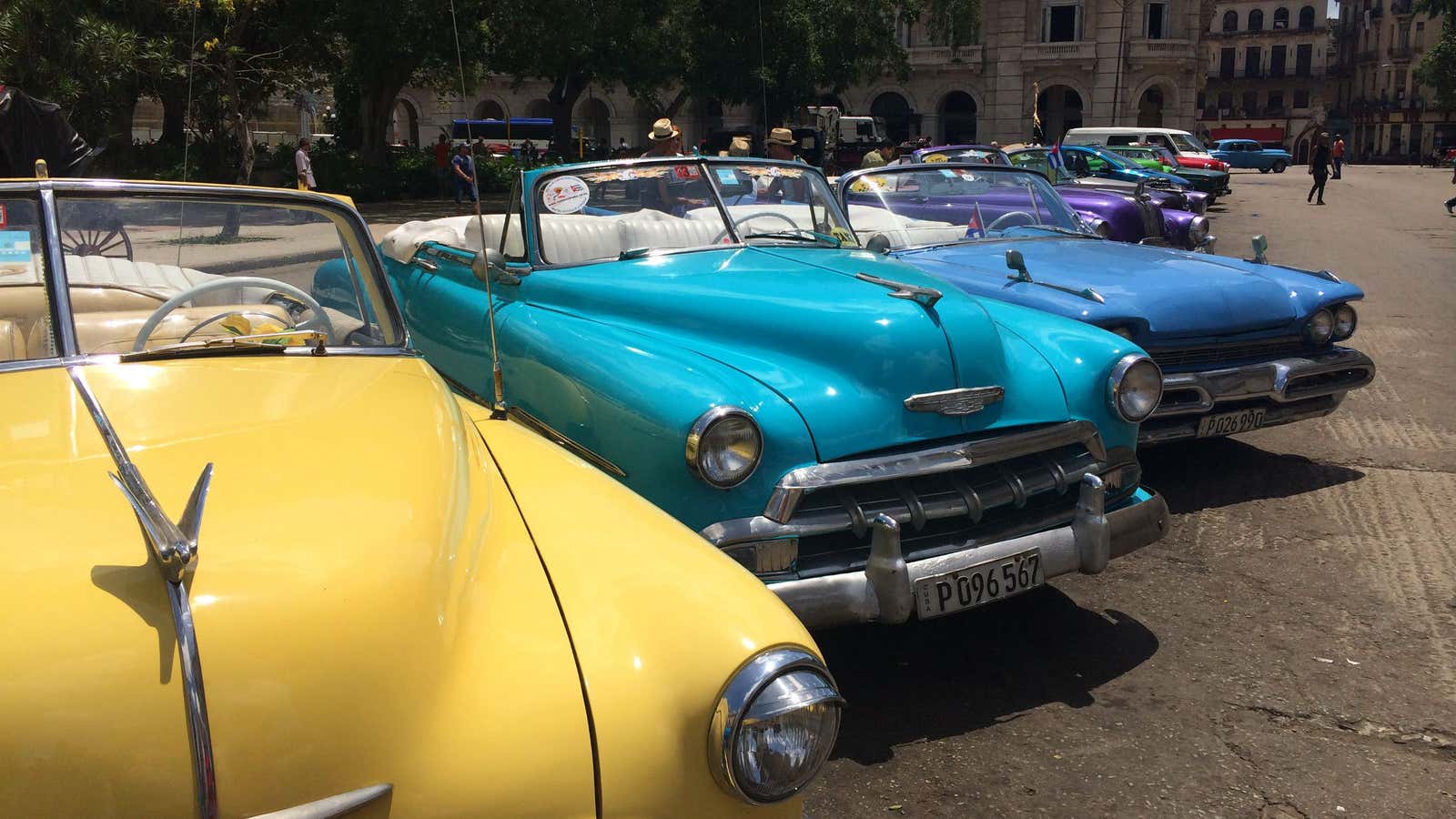 A row of classic convertibles for rent in central Havana.