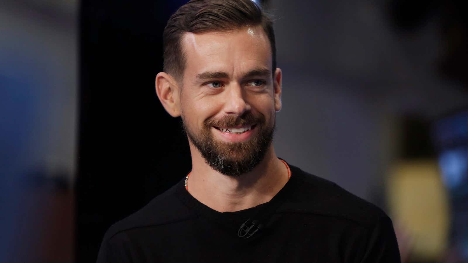 Why is Square (and Twitter) CEO Jack Dorsey smiling? New chip cards might mean more business for Dorsey.