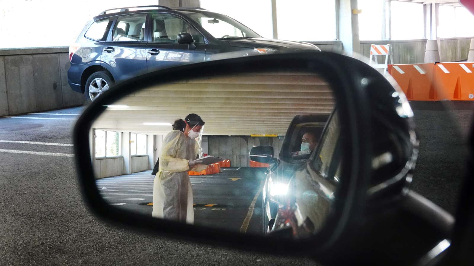 A drive-through testing site for Covid-19 in Connecticut, one of the only US states to report case totals on a town-by-town basis.