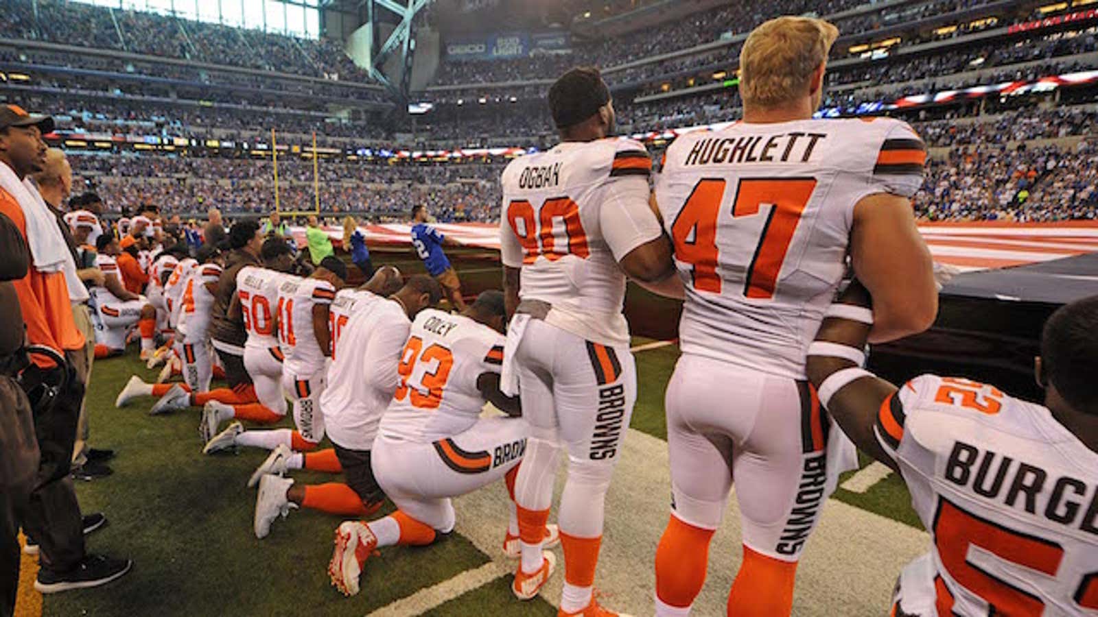 Sep 24, 2017; Indianapolis, IN, USA; The Cleveland Browns team stand and kneel during the National Anthem before the start of their game against the Indianapolis Colts  at Lucas Oil Stadium. Mandatory Credit: Thomas J. Russo-USA TODAY Sports – 10303419