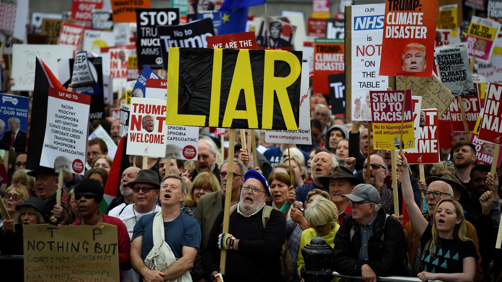 Demonstrators take part in an anti-Trump protest in Trafalgar Square.