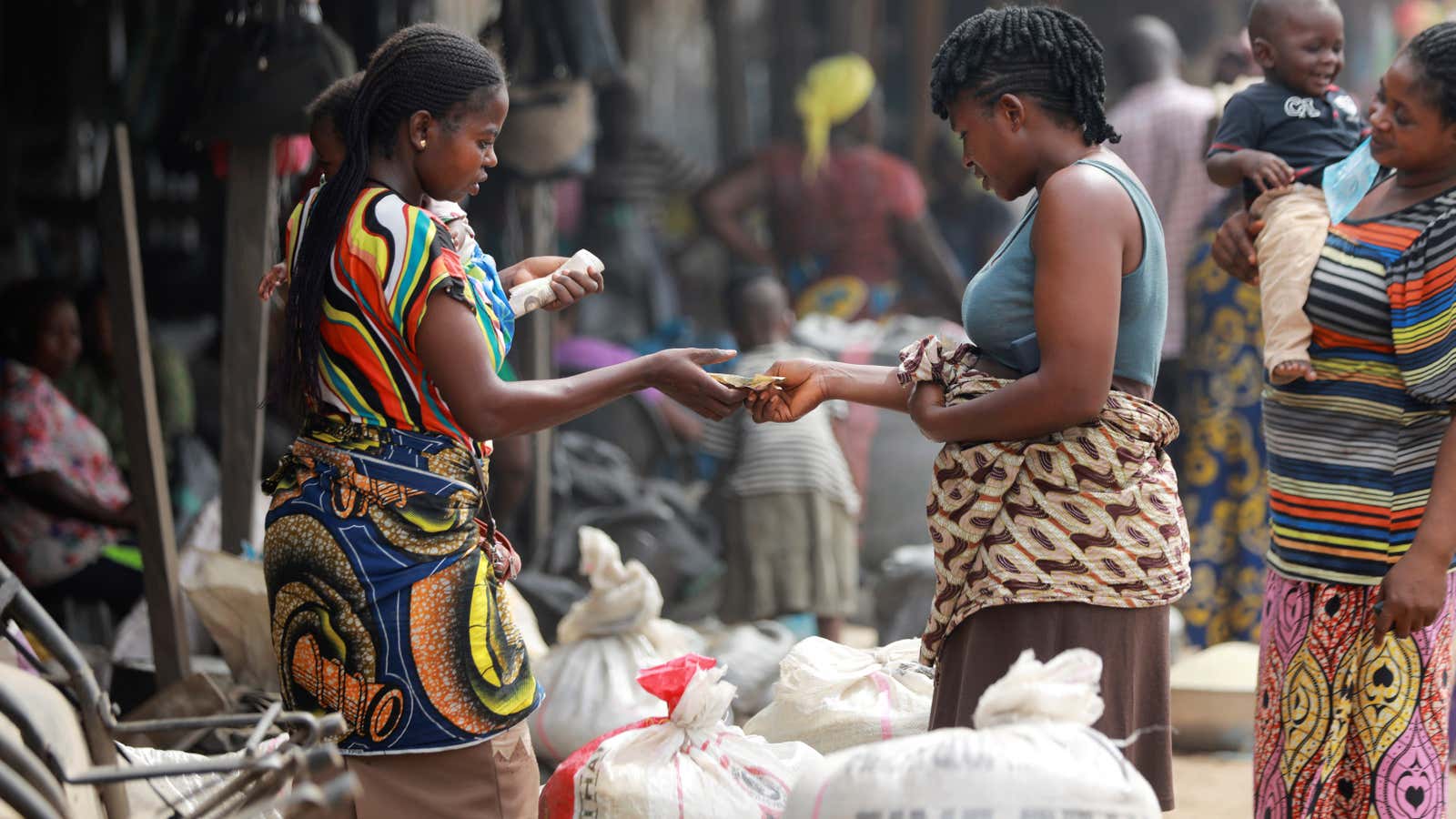 Buying rice at Wurukum Rice Mill in Makurdi, Nigeria