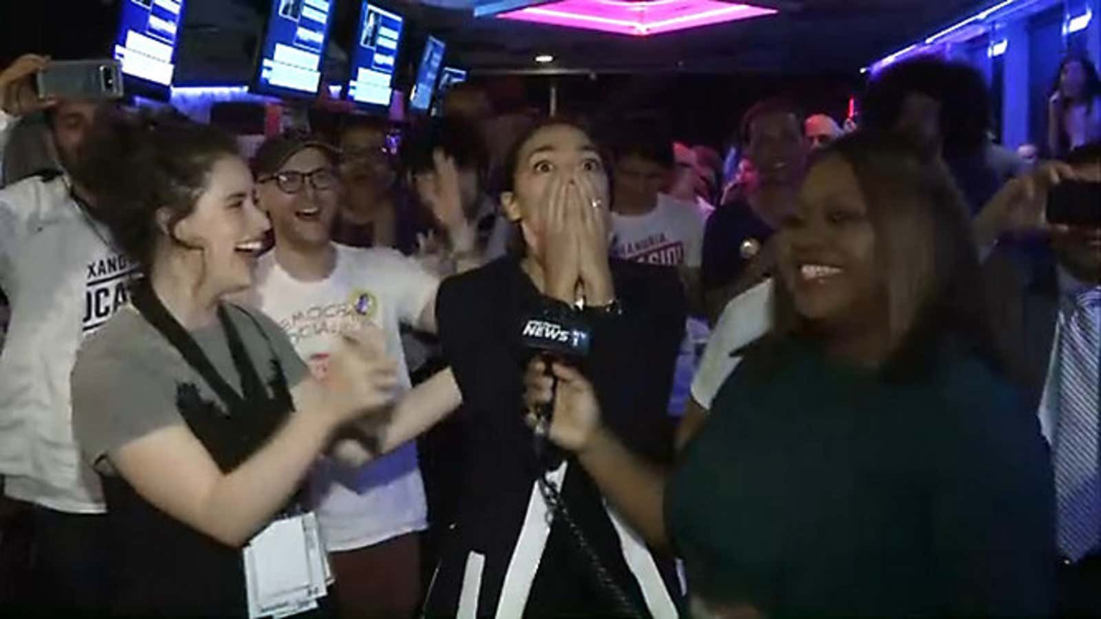 Alexandria Ocasio Cortez reacts to her win over Joe Crowley in House Democratic primary