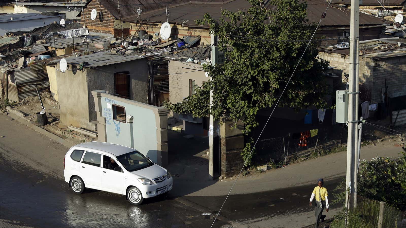 Alexandra, a township in Johannesburg, borders and contrasts Sandton, the wealthiest suburb in South Africa