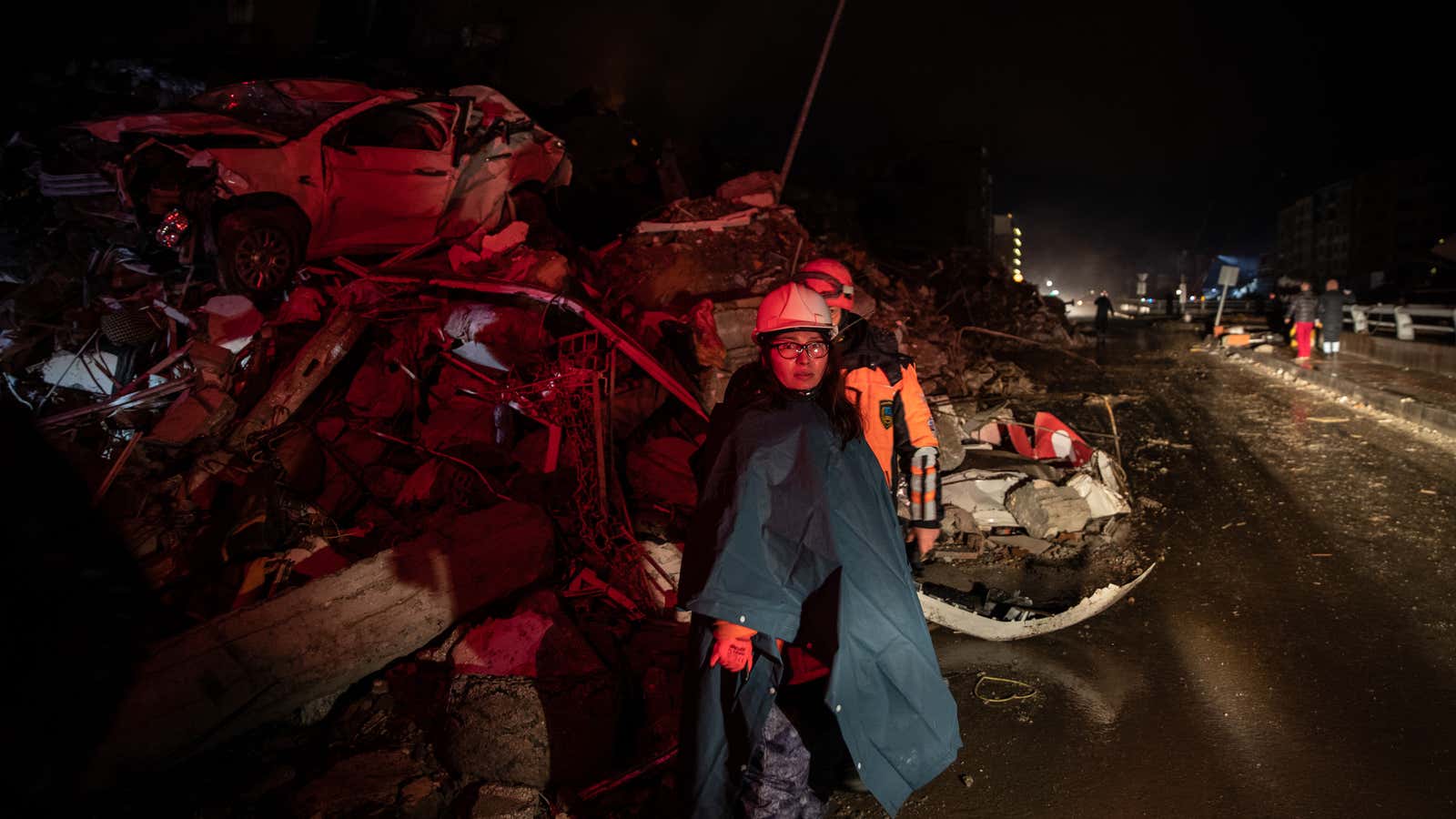 Rescue workers attend the scene of a collapsed building on February 06, 2023 in Iskenderun, Turkey.