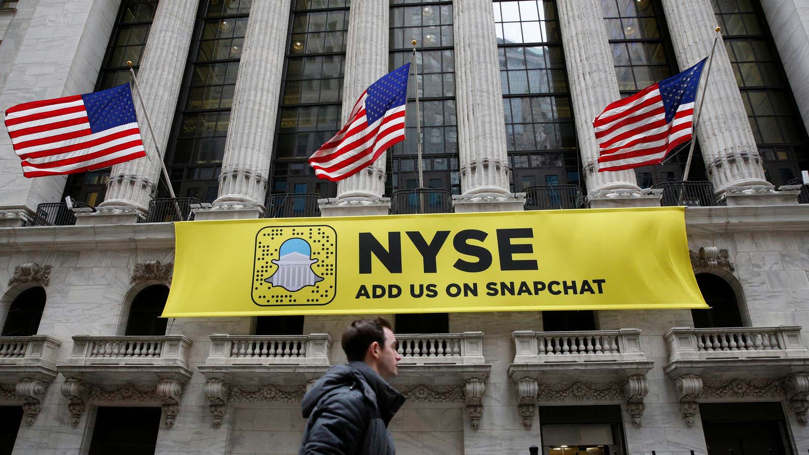 A Snapchat sign hangs on the facade of the New York Stock Exchange.