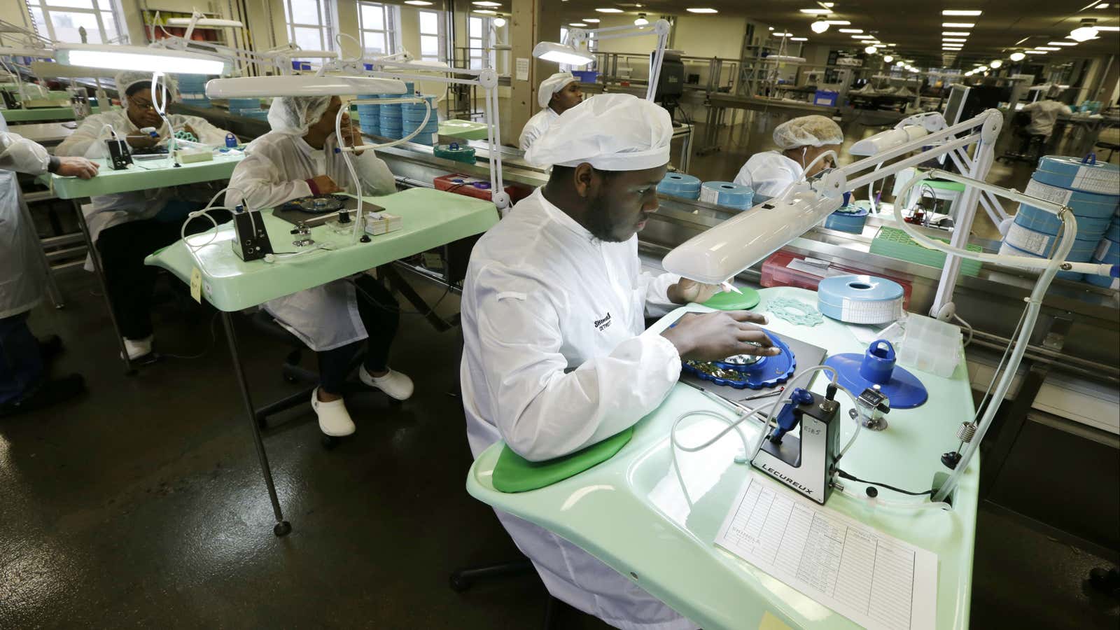 Shinola employees assembling watches in Detroit.