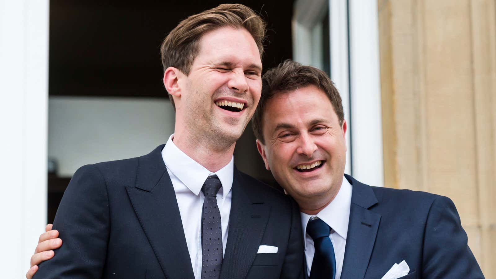 Xavier Bettel, right, with his new husband.