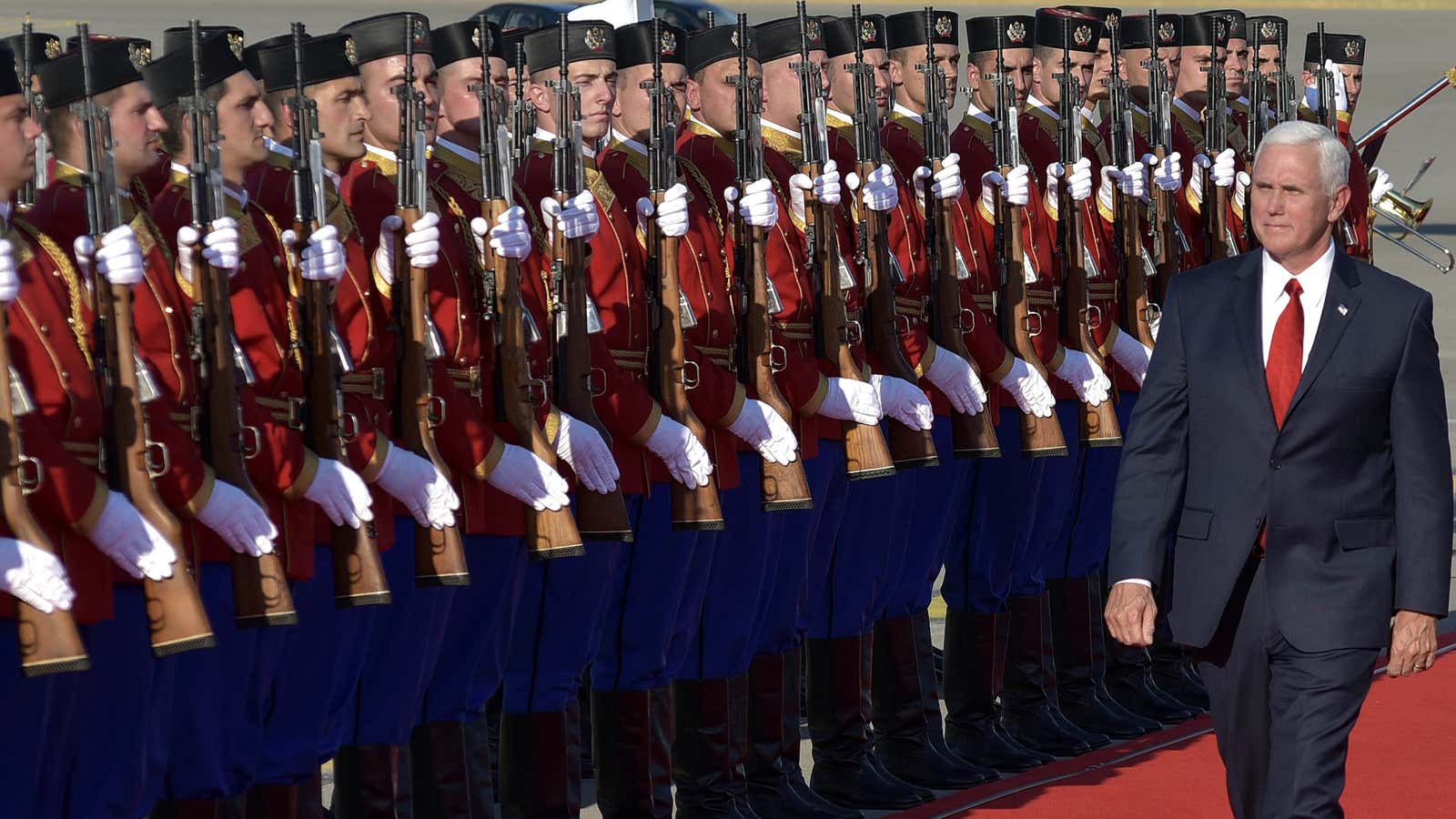 Mike Pence is greeted with a welcome ceremony in Montenegro.