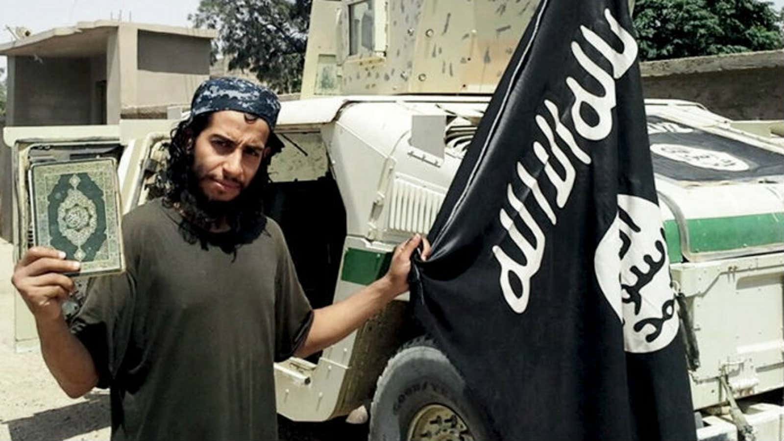 The man thought to be Abdelhamid Abaaoud, in a photo published by ISIL’s online magazine.