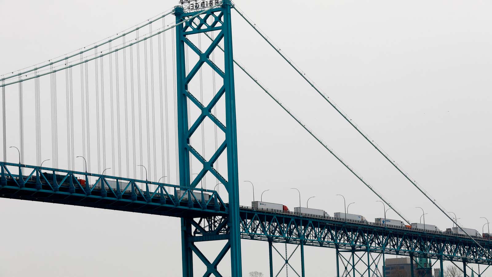 General view of the Ambassador Bridge that connects Detroit and Windsor, Canada on March 18, 2020 in Detroit, Michigan. The U.S. and Canada have agreed to temporarily restrict all nonessential travel across the border after the World Health Organization (WHO) declared coronavirus (COVID-19) a pandemic