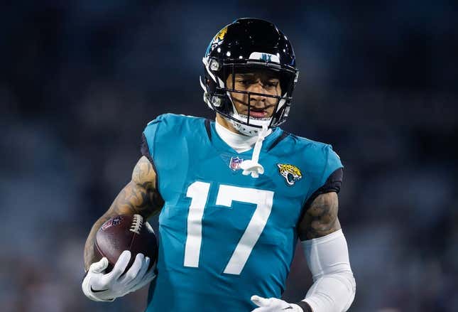 Jan 14, 2023; Jacksonville, Florida, USA; Jacksonville Jaguars tight end Evan Engram (17) against the Los Angeles Chargers during a wild card playoff game at TIAA Bank Field.