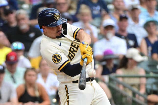 Aug 23, 2023; Milwaukee, Wisconsin, USA; Milwaukee Brewers shortstop Willy Adames (27) hits a two run home run in the sixth inning against the Minnesota Twins at American Family Field.