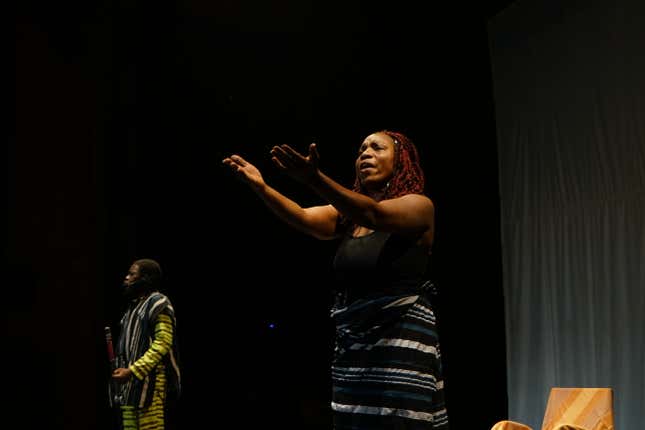 Griot Mabodou Sanou (left) and singer Maï Lingani (right) during a rehearsal for the premiere of the second act of Là-bas ou Ici at the Institut Français in Ouagadougou, Burkina Faso in March.