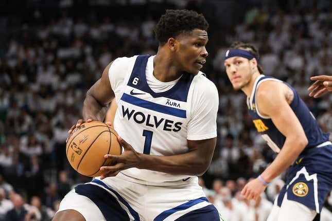 Apr 23, 2023; Minneapolis, Minnesota, USA; Minnesota Timberwolves guard Anthony Edwards (1) controls the ball against the Denver Nuggets during the fourth quarter of game four of the 2023 NBA Playoffs at Target Center.