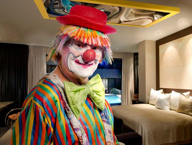 Image for article titled Perverted Clown Mounts Funhouse Mirror On Ceiling Above Bed