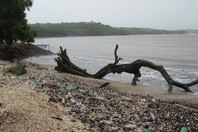 Discarded plastic bottles on a beach in India. Shifting to eco-friendly lifestyle means making the more inconvenient, time-intensive, cost and/or effort-intensive choice repeatedly.
