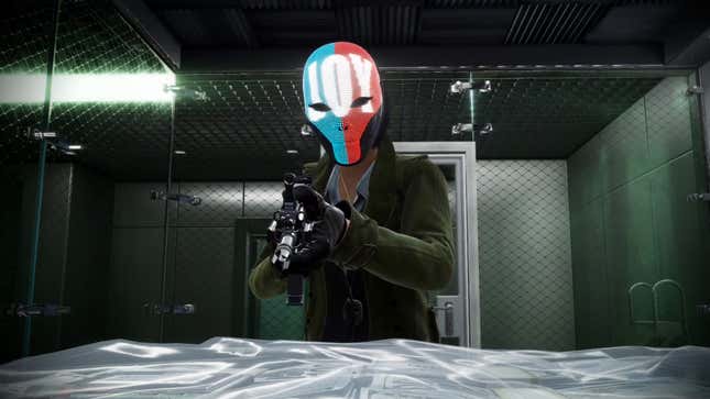 A Payday 3 heister looks at a bag of money while wearing an LED mask that has 'Joy written across it.