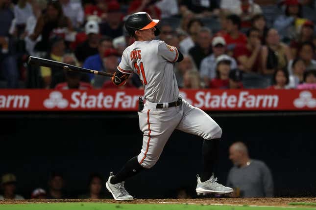 Sep 6, 2023; Anaheim, California, USA; Baltimore Orioles left fielder Austin Hays (21) hits an RBI single during the third inning against the Los Angeles Angels at Angel Stadium.