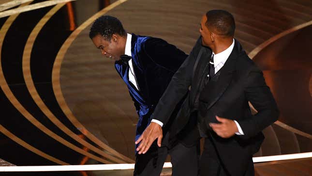 Will Smith punching Chris Rock at the 2022 Oscars