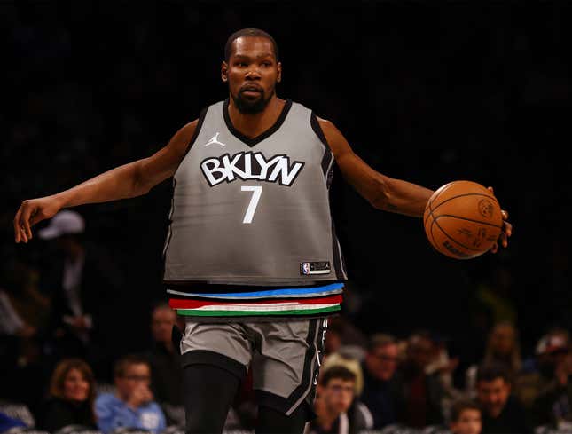 Image for article titled Kevin Durant Struggling To Shoot While Wearing 58 Different Jersey Variations