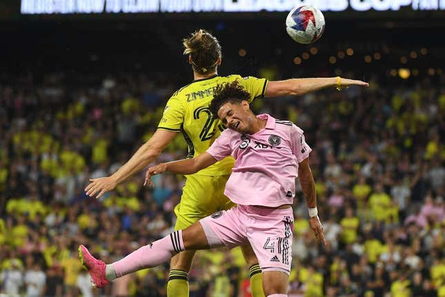 Aug 19, 2023; Nashville, TN, USA; Inter Miami midfielder David Ruiz (41) and Nashville SC defender Walker Zimmerman (25) head the ball during the second half for the Leagues Cup Championship match at GEODIS Park.