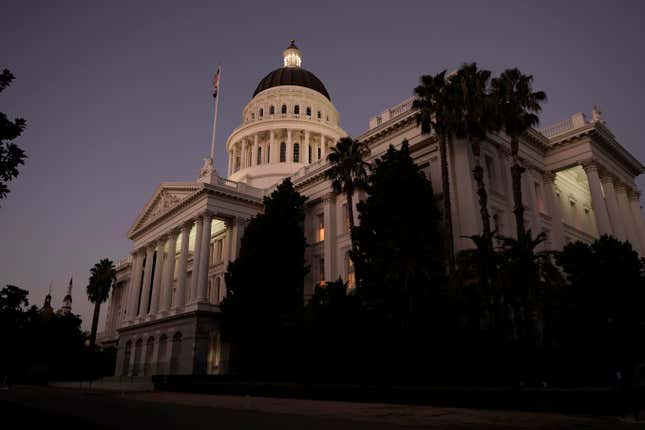 FILE - The lights of the state Capitol glow into the night in Sacramento, Calif., Wednesday, Aug. 31, 2022. California, which already has some of the strongest digital privacy laws in the U.S., is on the verge of handing consumers a major new tool to combat the sale and secret use of personal information they may never have agreed to share. Both houses of the state legislature have passed the Delete Act, which would establish a “one stop shop” where individuals could order hundreds of often shadowy data brokers to delete information such as their location history and financial details.(AP Photo/Rich Pedroncelli, File)