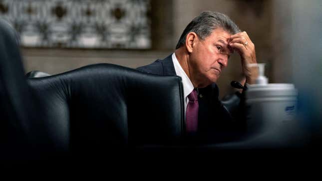 Sen. Joe Manchin pauses during a Senate Armed Services Committee hearing.