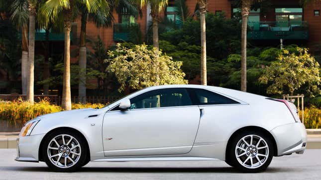 A photo of the side of a Cadillac CTS coupe. 