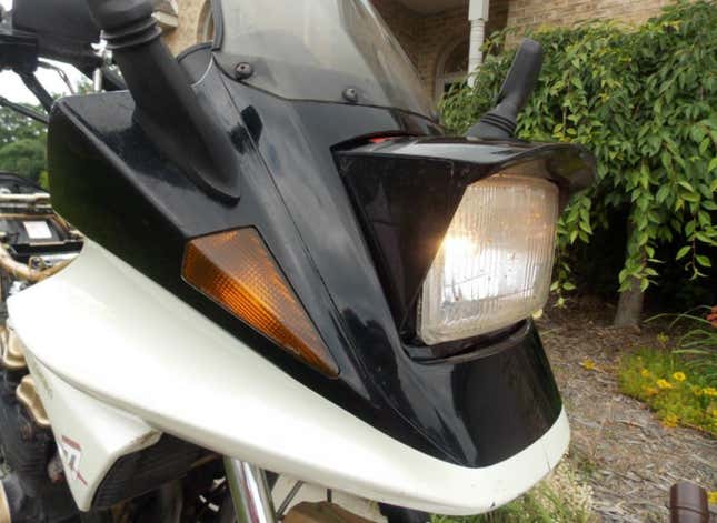 Image for article titled Suzuki Made A Rad Futuristic Motorcycle With A Pop-Up Headlight