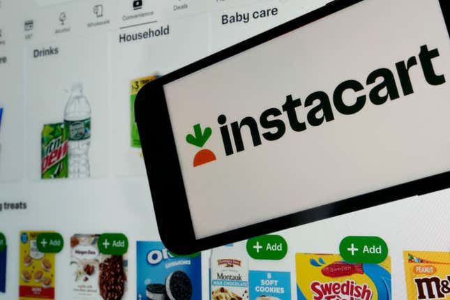 An instacart logo and an instacart webpage are shown in this photo, in New York, Wednesday, Sept. 6, 2023. (AP Photo/Richard Drew)