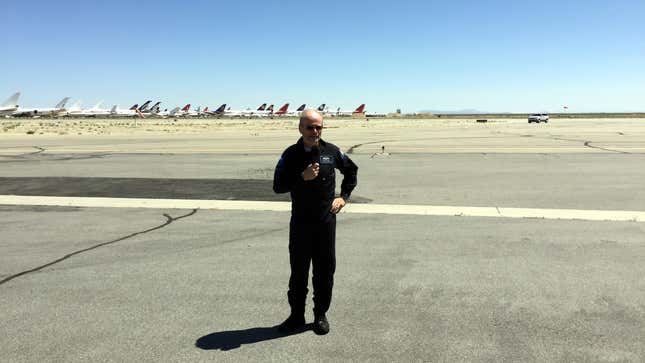 Pilot Dave Mackay talks to the crowd after his successful test flight.