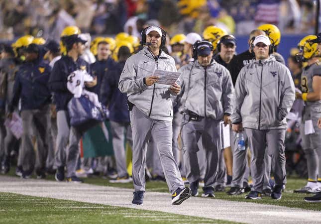 Sep 9, 2023; Morgantown, West Virginia, USA; West Virginia Mountaineers head coach Neal Brown walks long the sidelines during the second quarter against the Duquesne Dukes at Mountaineer Field at Milan Puskar Stadium.