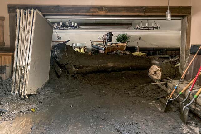 Extensive damage from a slow-moving black river of sludge is seen inside the Oak Glen Steakhouse and Saloon on Sept. 14, 2022, in Oak Glen, California.