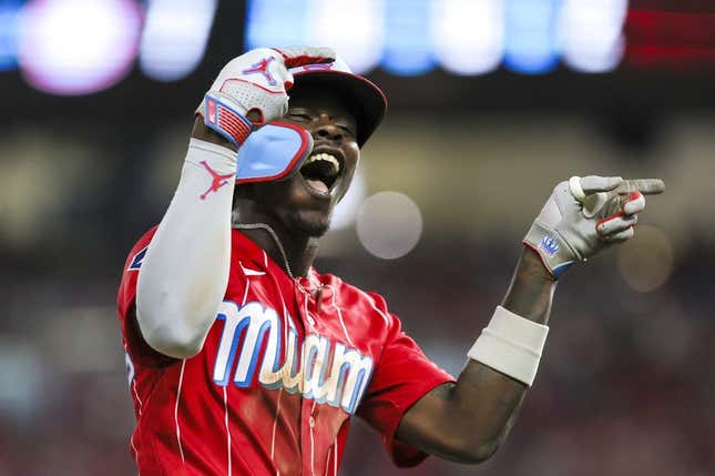 Sep 16, 2023; Miami, Florida, USA; Miami Marlins center fielder Jazz Chisholm Jr. (2) celebrates after hitting a grand slam against the Atlanta Braves during the eighth inning at loanDepot Park.