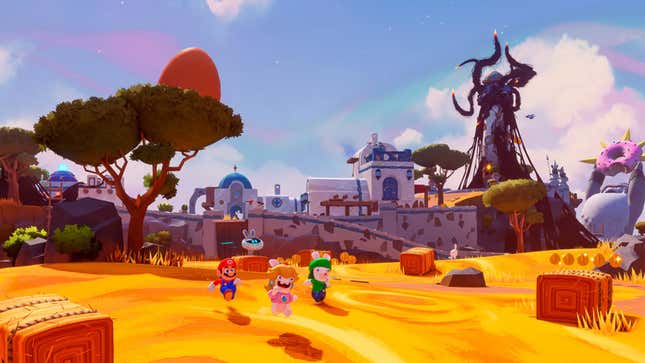 Mario and the rabbids run across a playful environment.