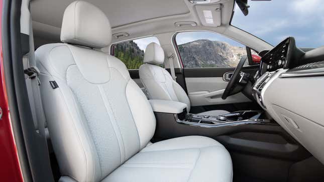 A photo of the white leather seats in a Kia Sorento SUV. 
