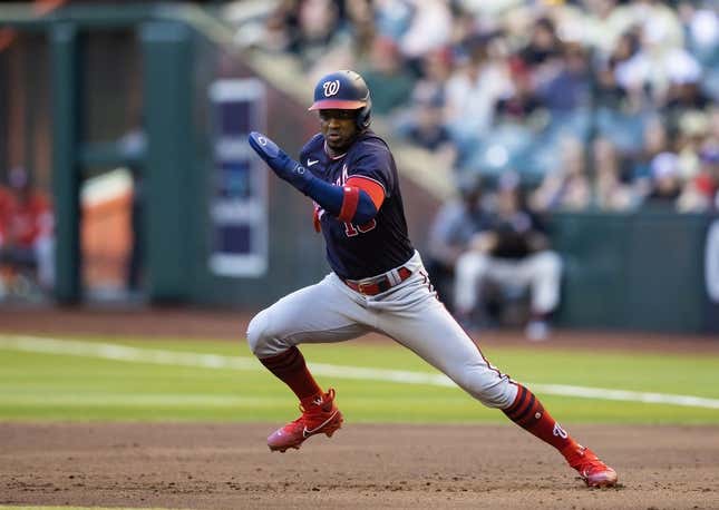 May 6, 2023; Phoenix, Arizona, USA; Washington Nationals base runner Victor Robles attempts to steal second base against the Arizona Diamondbacks in the third inning at Chase Field.